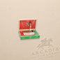 Arcadia Cigars Arturo Fuente OpusX 2020 Viento d'Amor premium cigars in a decorative green and red presentation box.