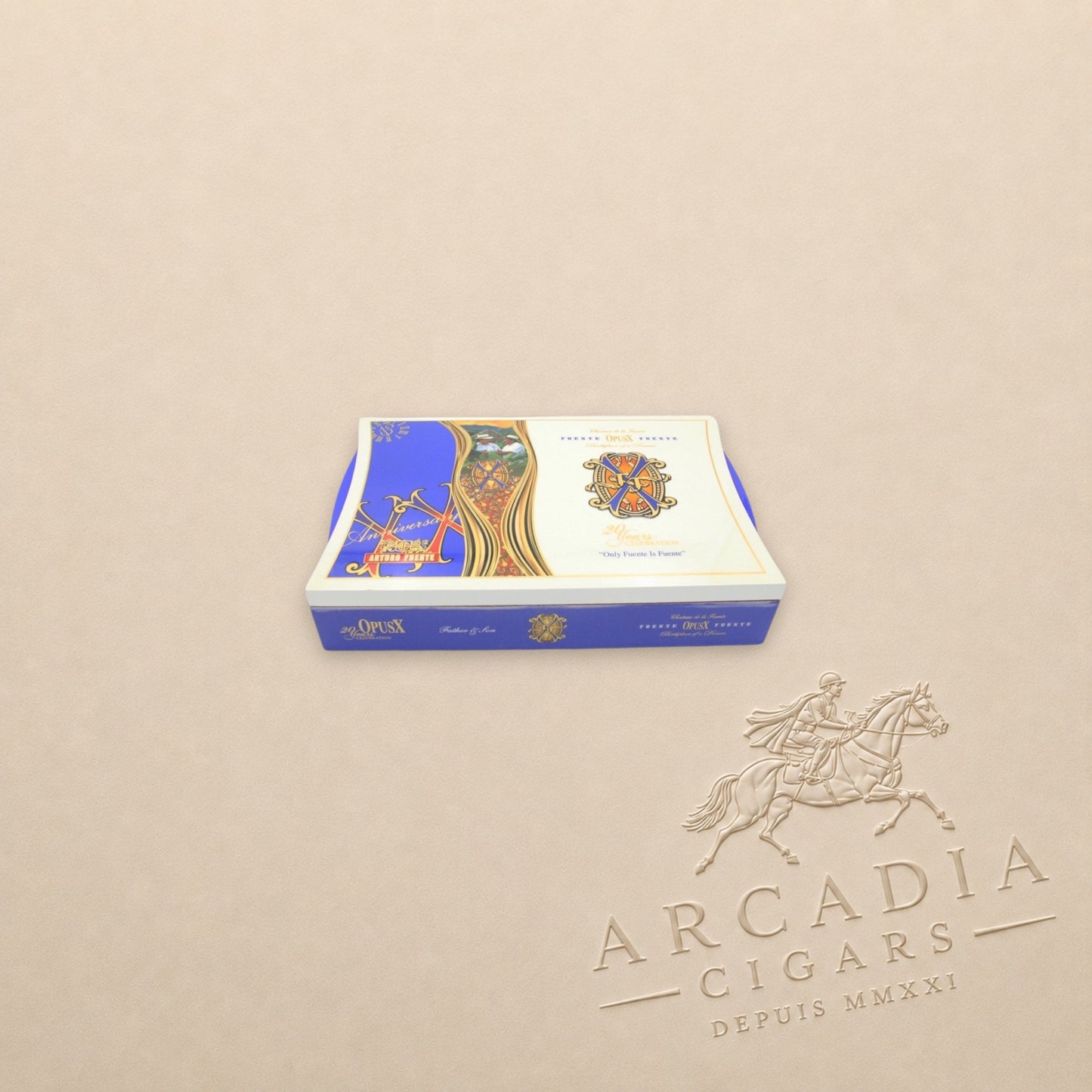 Arcadia Cigars Arturo Fuente OpusX 20 Years Celebration Father and Son cigar box with blue and gold ornate branding.