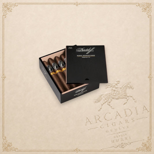 Arcadia Cigars Davidoff Puro Dominicano Perfecto cigars in an open black wooden box on a neutral background