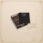 Arcadia Cigars Davidoff Puro Dominicano Perfecto cigars in an open black wooden box on a neutral background