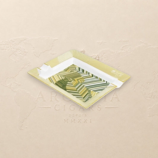 Arcadia Cigars Davidoff Cave de Paille ashtray, golden-beige straw marquetry with green abstract pattern on lacquered base.