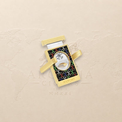 Arcadia Cigars S.T. Dupont gold cigar cutter with black face, red, white, green, blue X pattern, and textured grip.