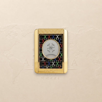 Arcadia Cigars S.T. Dupont gold cigar cutter with black face, red, white, green, blue X pattern, and textured grip.