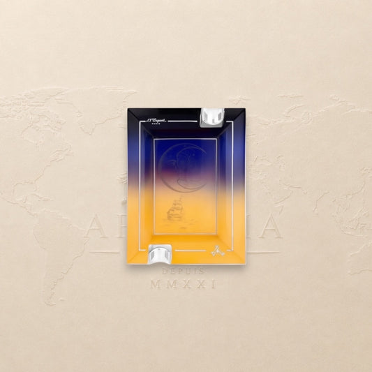 Arcadia Cigars S.T. Dupont Montecristo L' Aurore porcelain ashtray with sunrise motif, pink and gold tones, two rests.